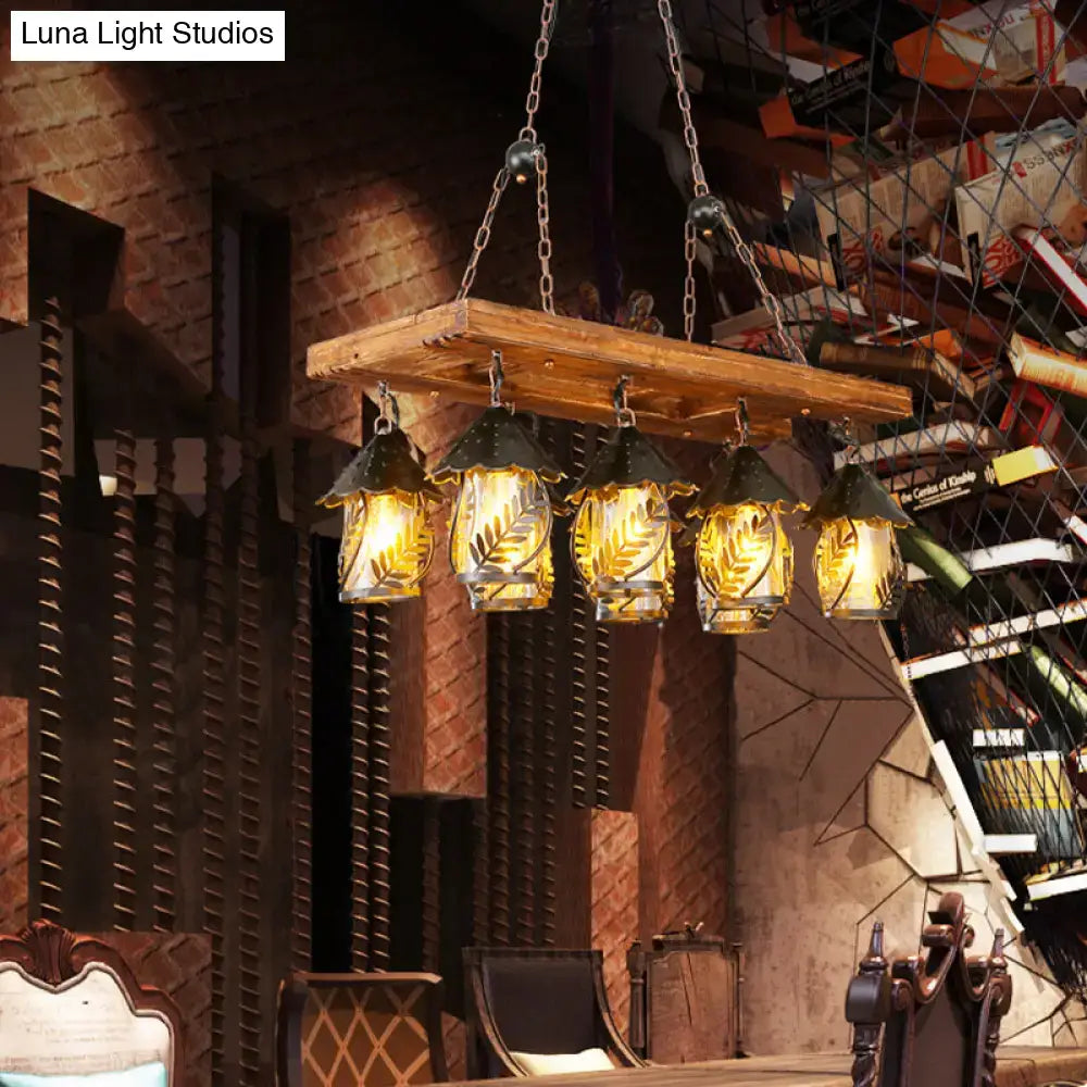 Rustic wooden plank chandelier with five amber glass lanterns and black metal shades for 220v-240v use