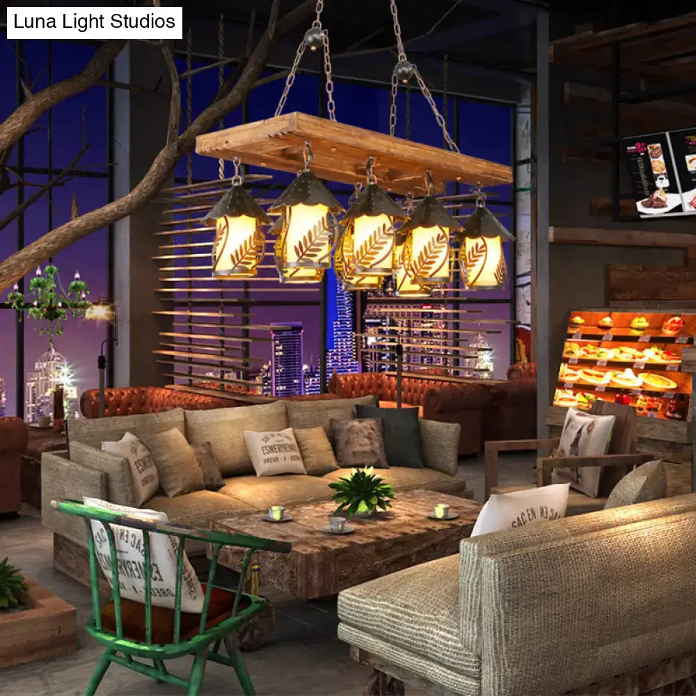 Rustic wooden chandelier with five amber-lit lanterns leaf etchings metal chains for 220v-240v rectangle white fabric clear design