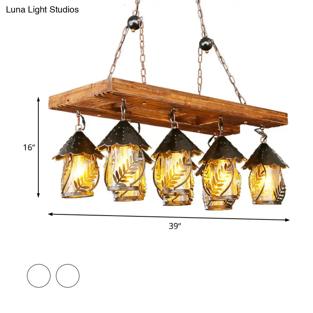 Rustic wooden plank chandelier with five amber glass lanterns and black metal roofs in decorbites vintage 8-light island pendant