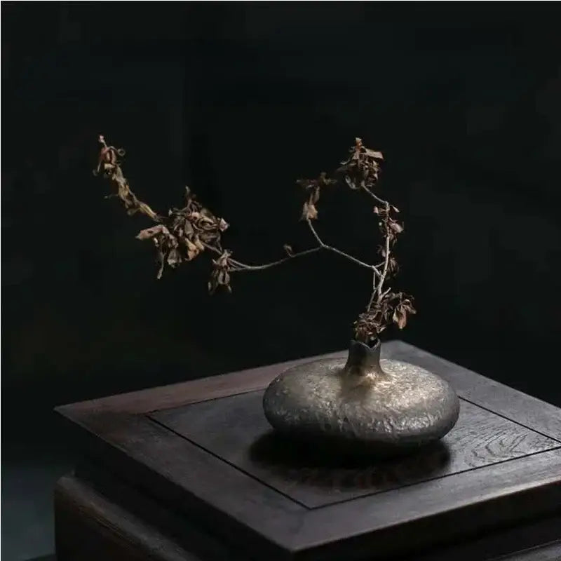 Matte silver textured ceramic vase with narrow neck and dried branches for chinese retro home decor by decorbites