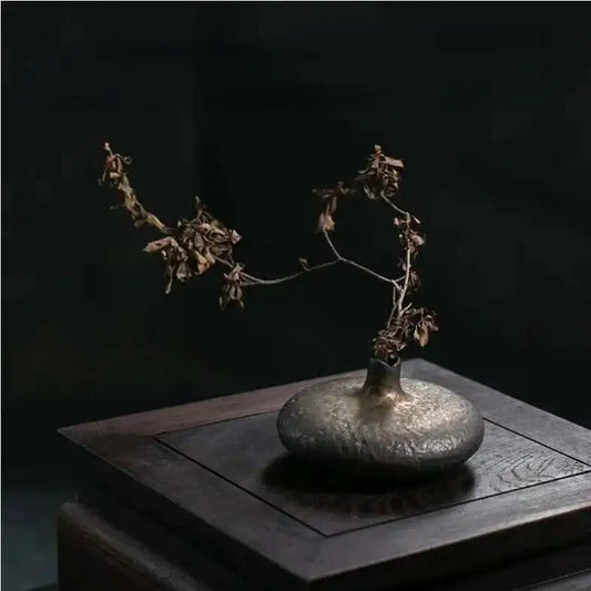 Matte silver textured ceramic vase with narrow neck and dried branches for chinese retro home decor by decorbites