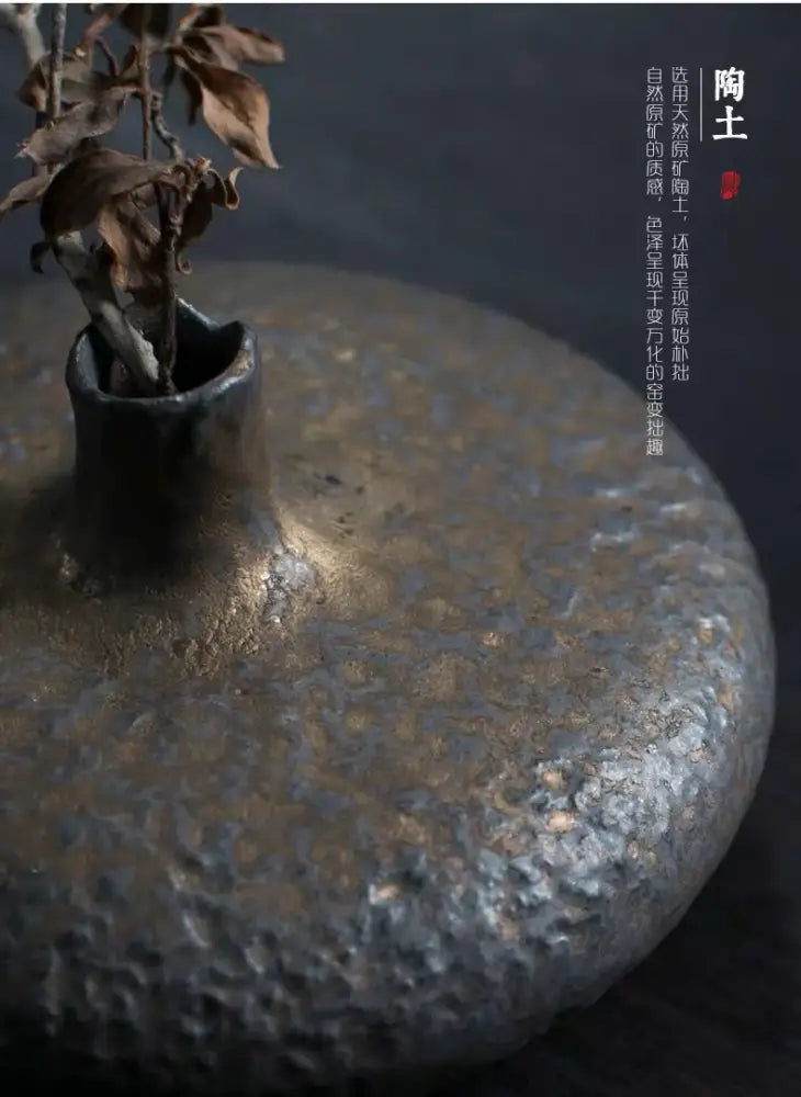DecorBites™ vintage chinese ceramic vase in dark gray with hammered texture holding dried leaves for home decor