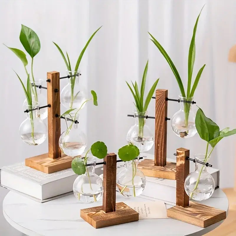 DecorBites™ vintage wooden stand holding clear two bulb vases with green plants for low style desktop propagation