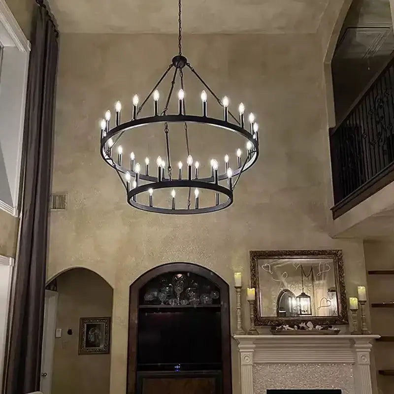 Black wrought iron decorbites™ vintage modern led pendant chandelier with multiple tiers and candle style bulbs