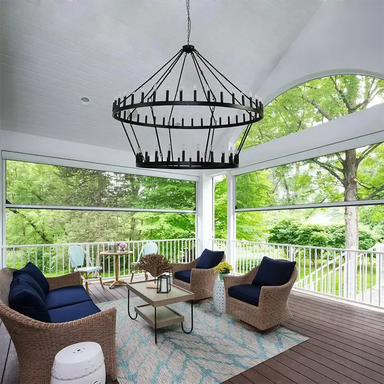 Black wrought iron DecorBites™ vintage modern LED pendant chandelier with multiple candle-style bulbs for ceiling lighting