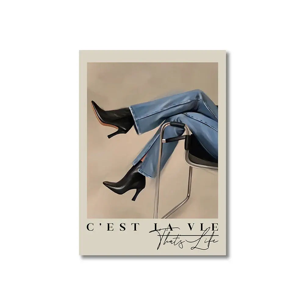 Black leather high-heeled ankle boots paired with light blue denim jeans beside vintage pink cartoon print canvas wall art