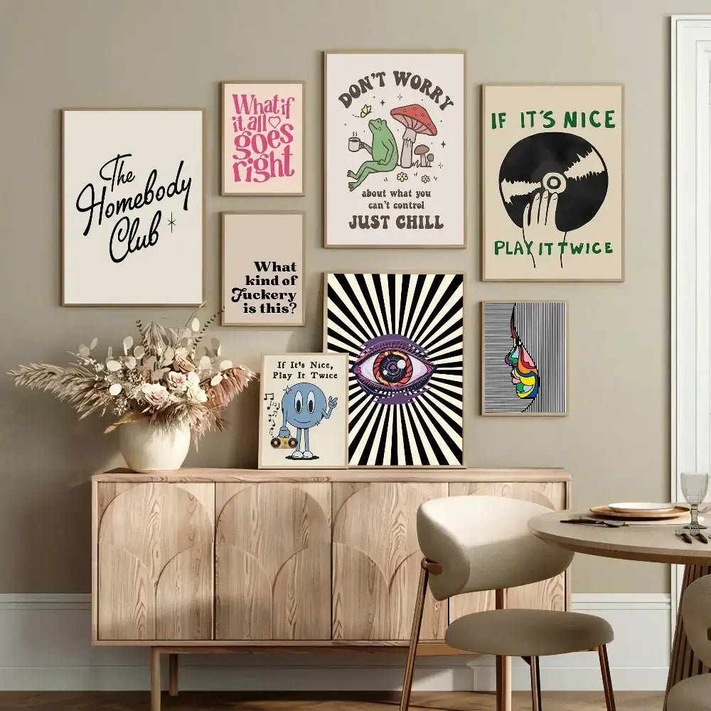 A collection of DecorBites™ vintage pink cartoon print canvas wall art with colorful retro designs above a wooden console table