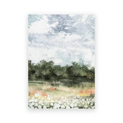 DecorBites vintage summer landscape canvas print featuring a watercolor field of white and pink flowers under gray sky