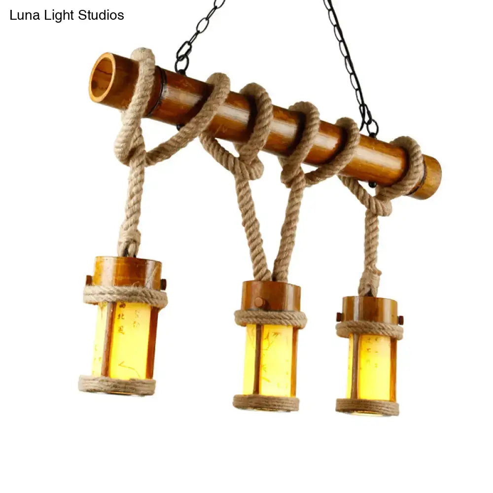 Rustic bamboo pendant light with three amber glass lanterns and natural rope cord compatible with 220v-240v and 110v-120v