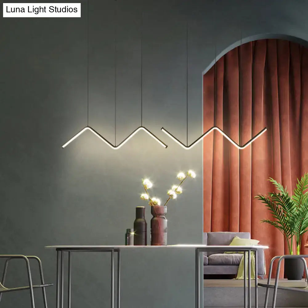 DecorBites™ W-Shaped LED pendant light fixture with sleek metal zigzag design and warm white illumination for dining room