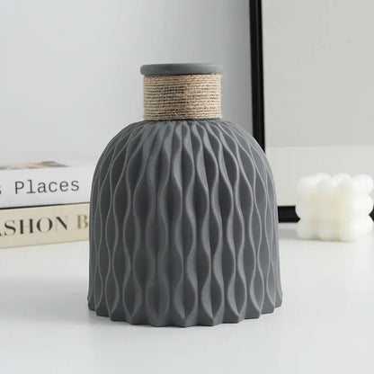 Gray ripple plastic vase with water ripple textured surface and natural twine-wrapped neck by DecorBites™ in modern Nordic style