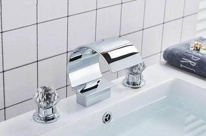 Chrome-finished DecorBites waterfall bathroom basin faucet with crystal knob handles for hot and cold water mixing