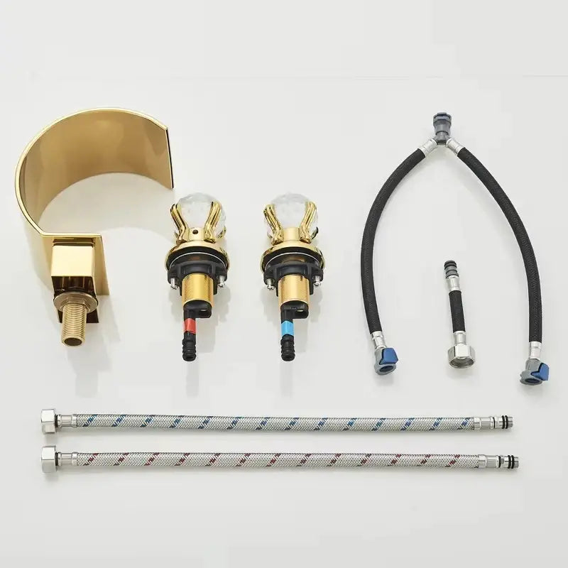 Gold-finished DecorBites waterfall bathroom basin faucet with clear glass knobs and brass hardware for hot cold mixer