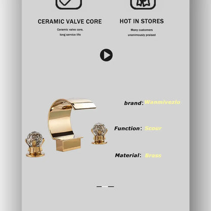 Gold brass DecorBites™ waterfall bathroom basin faucet with crystal-encrusted handles and sleek curved spout for hot cold mixer