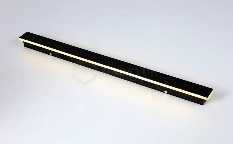 Decorbites™ waterproof led outdoor wall light is a black rectangular led long wall light with gold-colored trim and sleek design