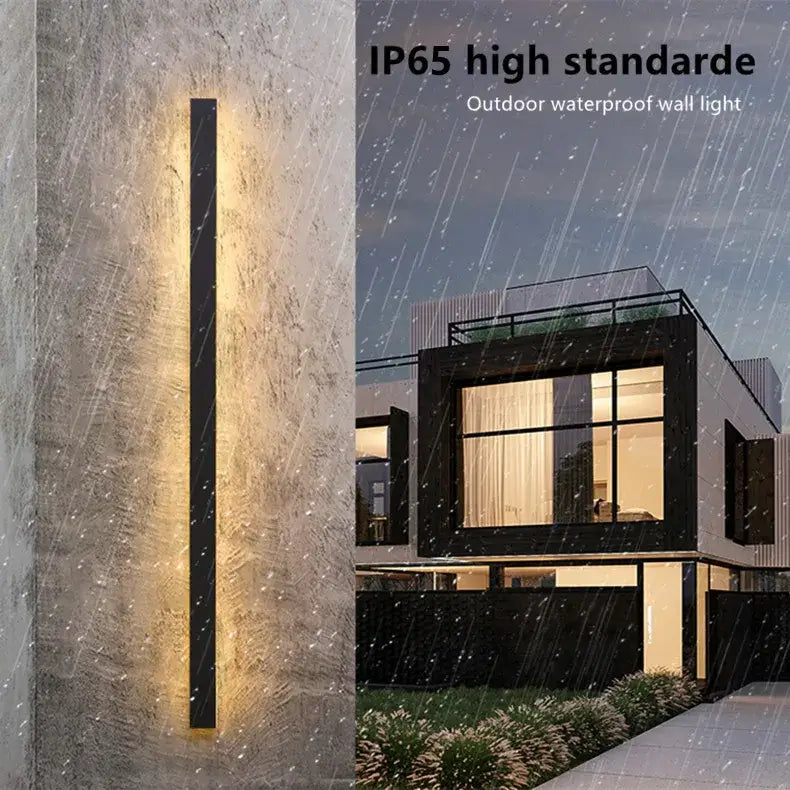 Slim black rectangular waterproof led outdoor wall light by decorbites with warm yellow illumination