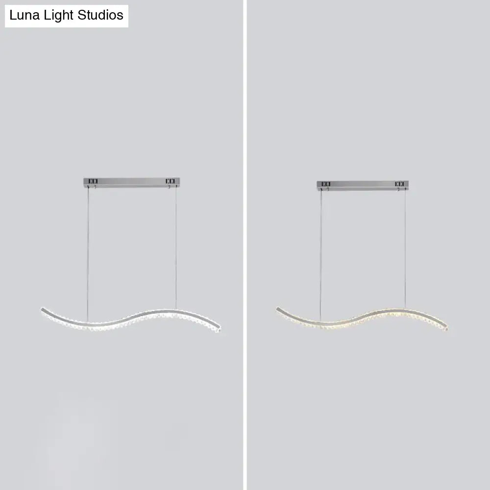 Modern silver-toned wave-shaped DecorBites™ crystal LED pendant lighting for dining room with sleek minimalist design