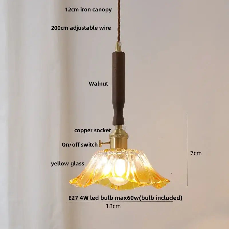 Delicate yellow glass pendant light with walnut iron canopy and copper socket paired with vintage white ceramic led pendant light