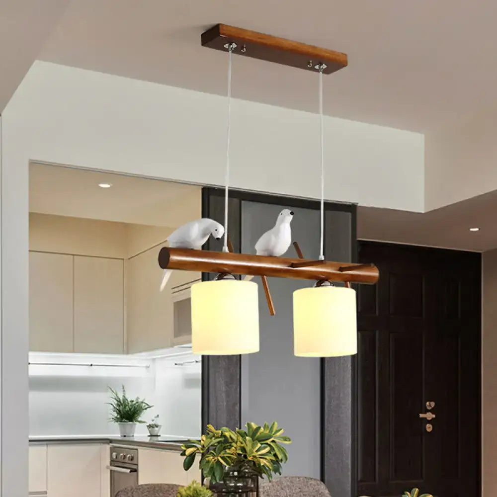 DecorBites™ white glass led pendant light with two cylindrical lampshades and resin bird figurines for cylinder restaurant use