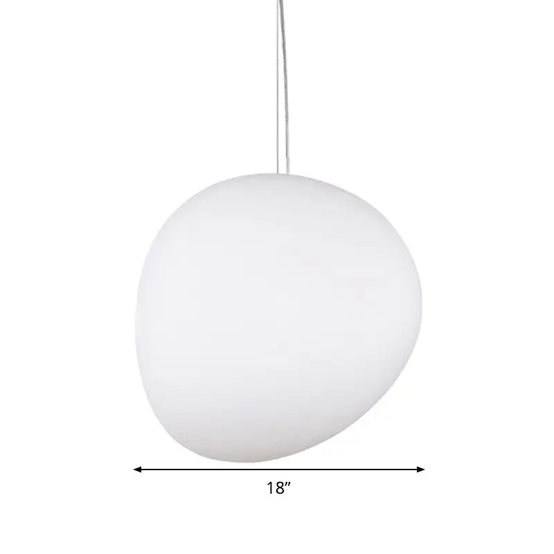 A sleek decorbites™ white glass oval pendant light with an 18-inch smooth rounded glass oval ceiling shade