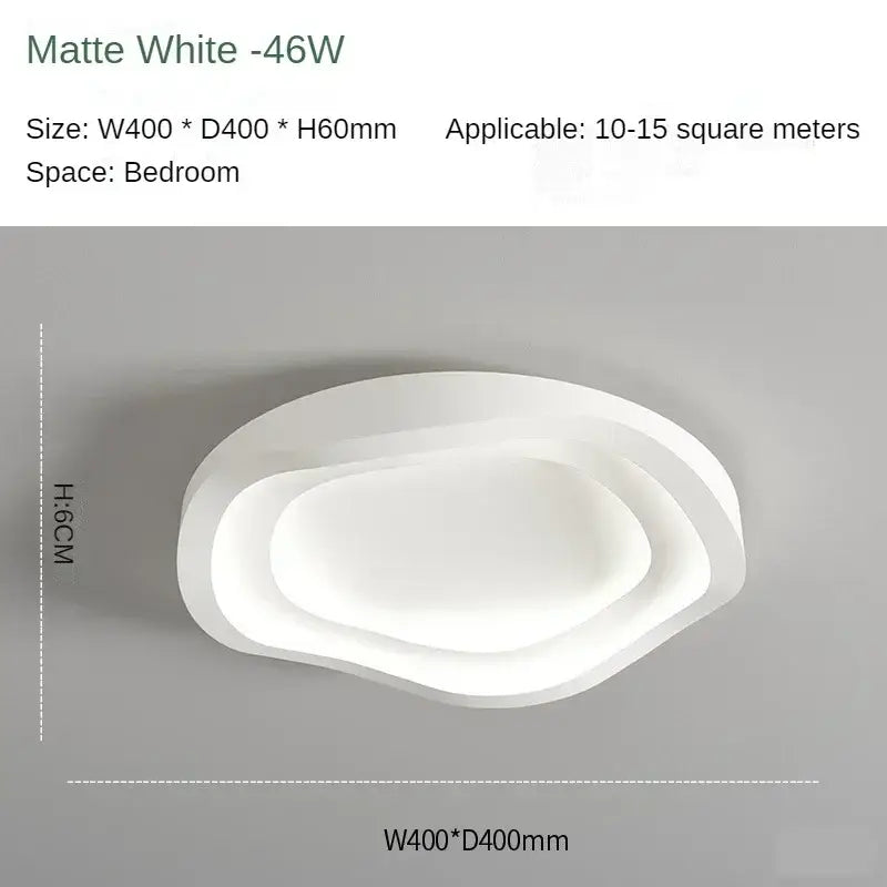 Modern matte white led ceiling lamp with oval layered concentric rings for minimalist home decor by DecorBites