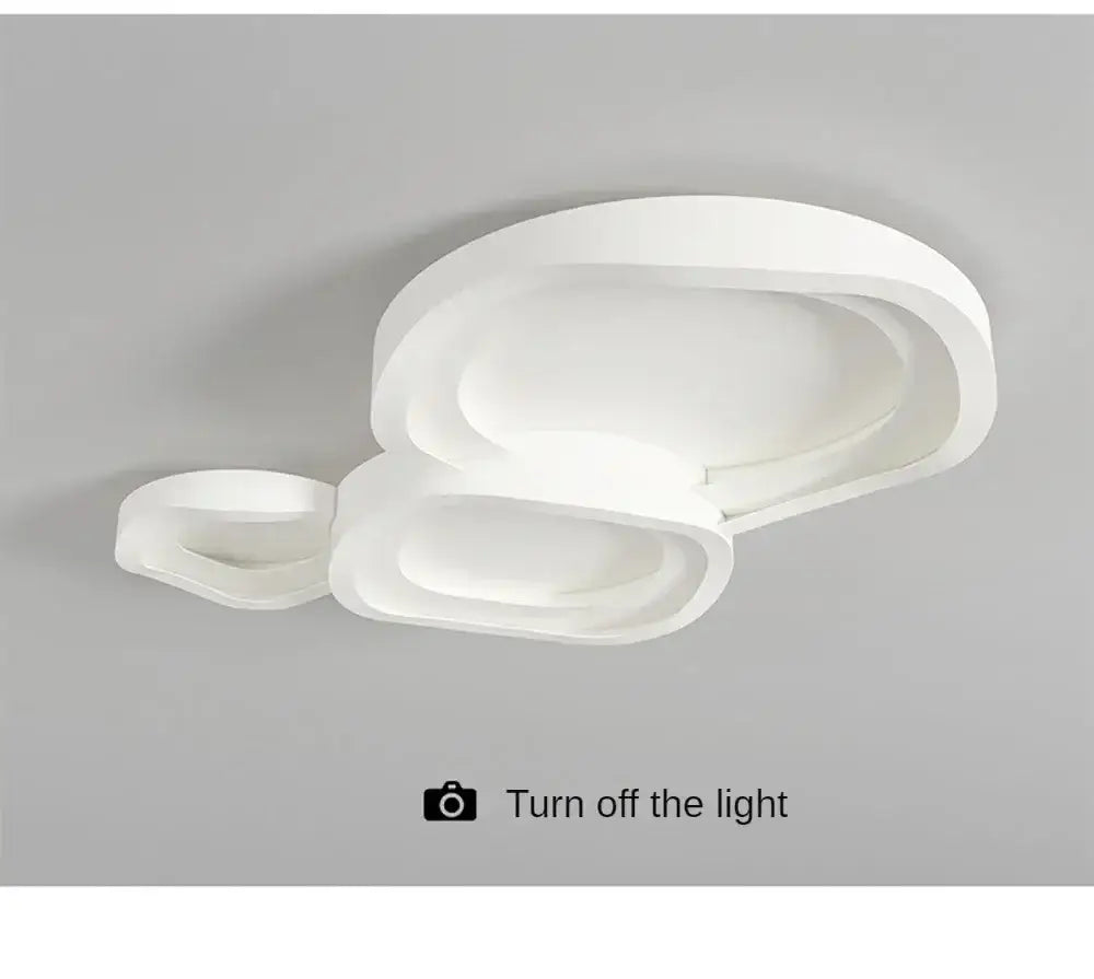 Modern minimalist white led ceiling lamp with layered oval rings for stylish home decor by decorbites