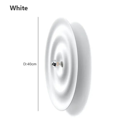 White nordic bauhaus round lamp with 40cm diameter ridged circular design and central chrome mounting fixture