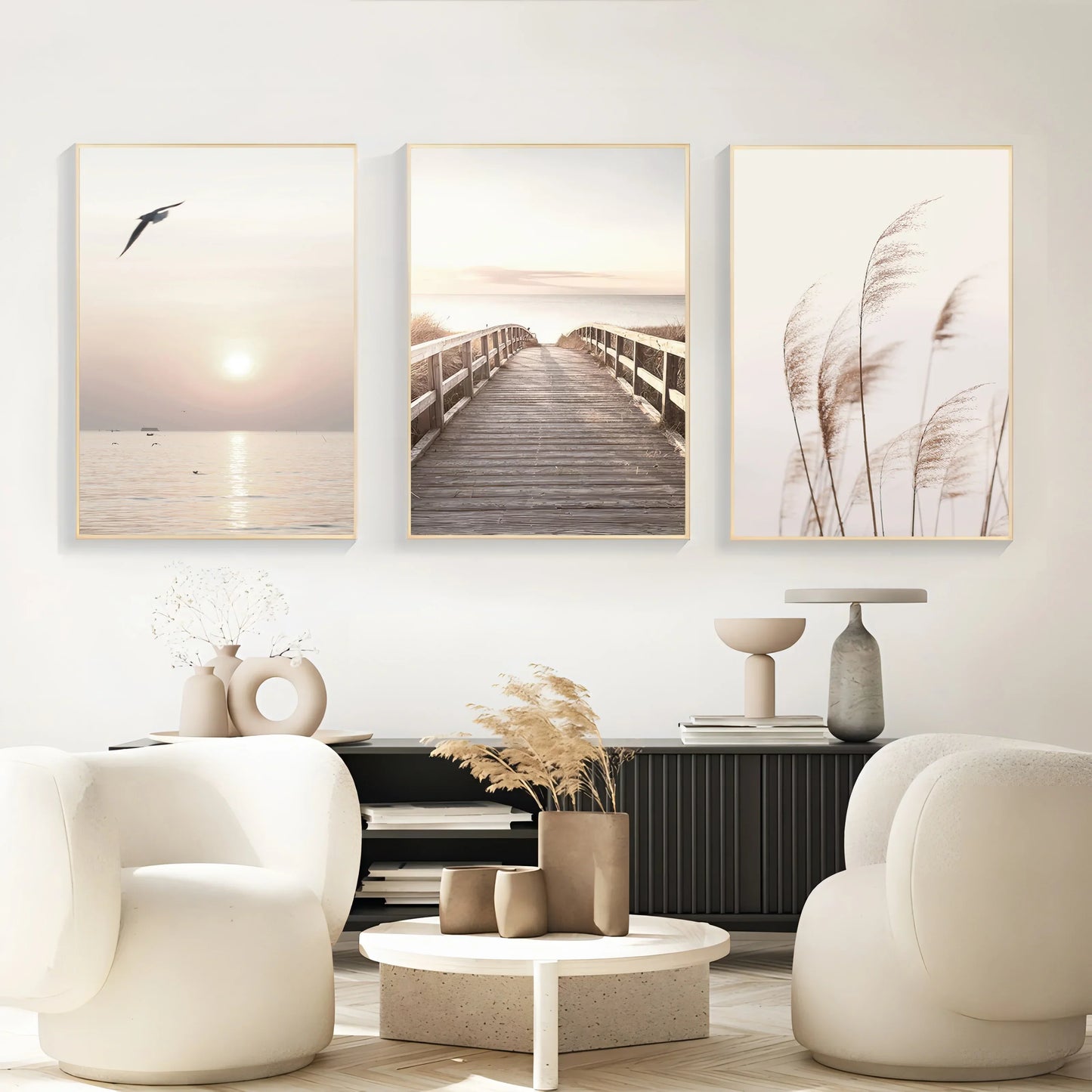 Three framed minimalist white seascape canvas art pieces with nature-inspired beige and muted tones by DecorBites