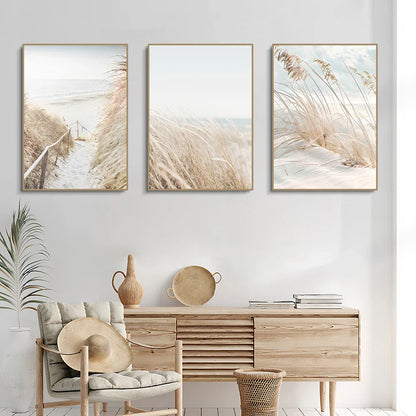 Three framed decorbites™ white seascape canvas set with beige and white beach and botanical wall art featuring coastal paths