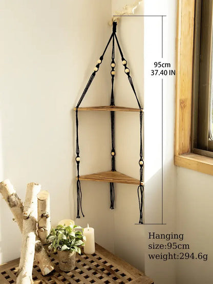 DecorBites wooden corner shelf with black macrame, light wood triangular shelves, and wooden beads in boho style