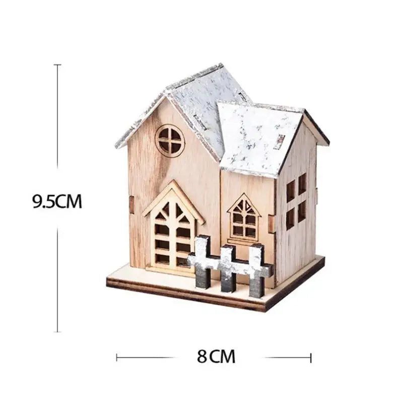 Decorbites wooden led light house Christmas decoration with rustic natural wood finish and weathered white roof and fence
