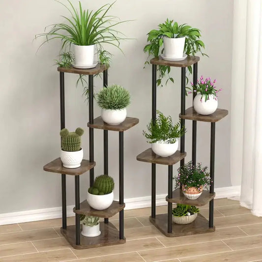 Decorbites™ wooden plant stand with dark metal frame and rustic shelves displaying potted plants in white pots