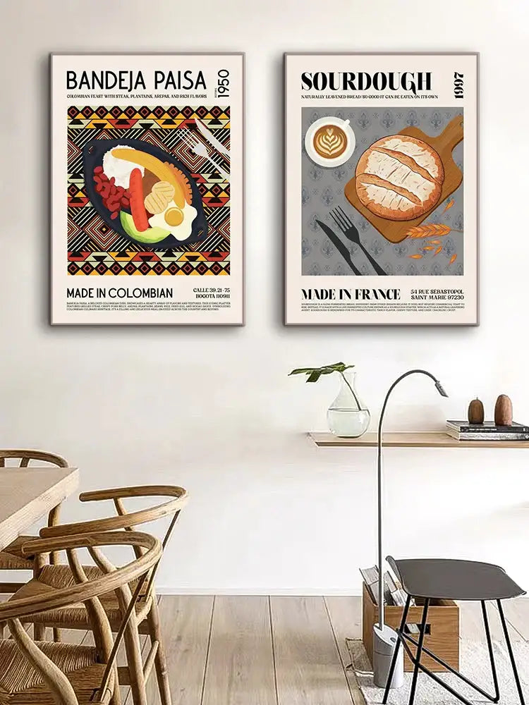Two framed vintage-style decorbites™ world cuisine canvas paintings featuring colombian bandeja paisa and sourdough loaf