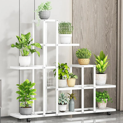 White wrought iron plant stand with multiple shelves and wheels by decorbites for versatile plant display