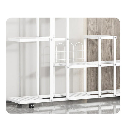 White wrought iron plant stand with multiple shelves decorative arched accents and wheels by decorbites