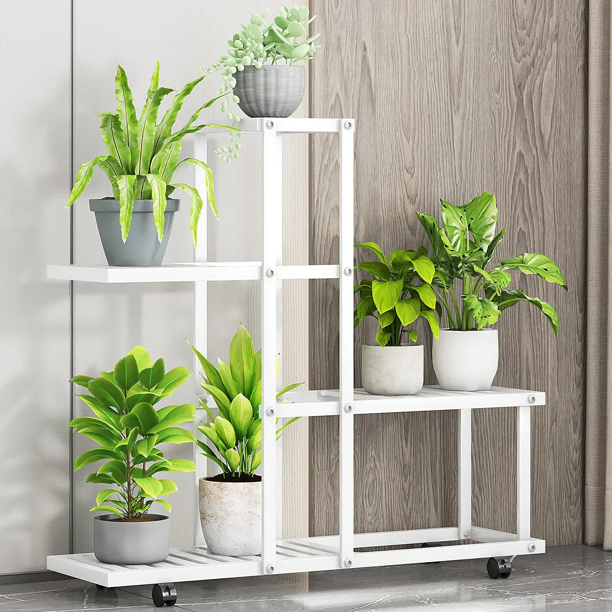 White wrought iron plant stand with four shelves and black caster wheels by DecorBites for indoor plants