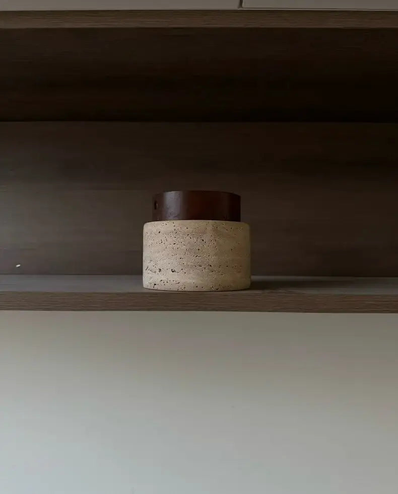 Beige textured concrete container with dark brown wooden lid displayed alongside decorbites™ yellow marble ceiling light