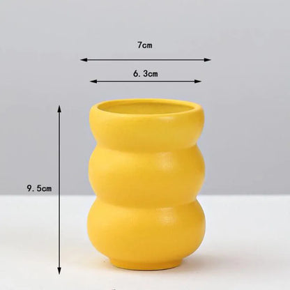 DecorBites™ yellow porcelain flower vase with segmented bumpy design for elegant home decor display