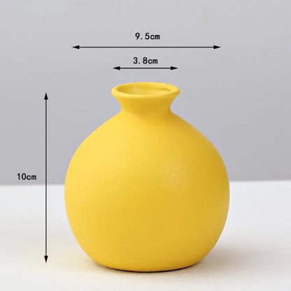 DecorBites™ yellow porcelain flower vase with rounded body and narrow neck for elegant home decor display