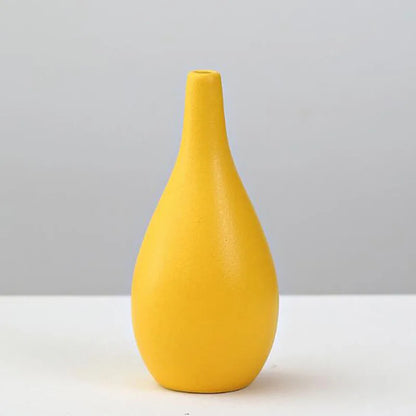 Decorbites™ yellow porcelain flower vase with a sleek matte finish and slender neck for elegant home decor