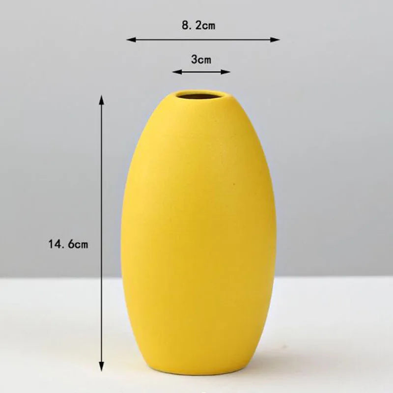 DecorBites™ yellow porcelain flower vase with a sleek matte finish and smooth egg-shaped silhouette for home decor