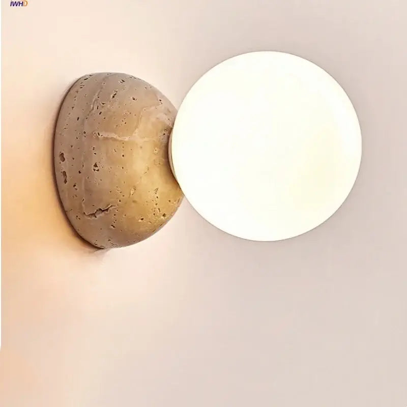 Modern yellow travertine wall sconce with beige concrete base and round white diffuser for bedroom decorbites yellow travertine