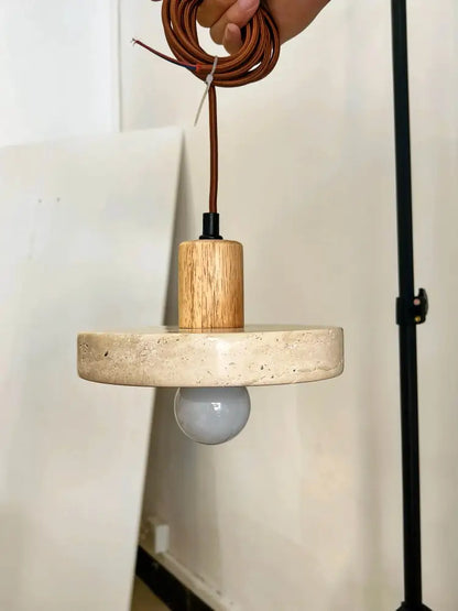 DecorBites™ yellow travertine pendant light with a natural wood cylinder and stone pendant for kitchen island lighting