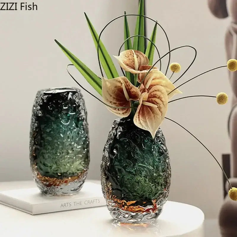 Elegant deep green glass vase with textured surface and gold-toned base featuring delicate floral decorbites deep green decor