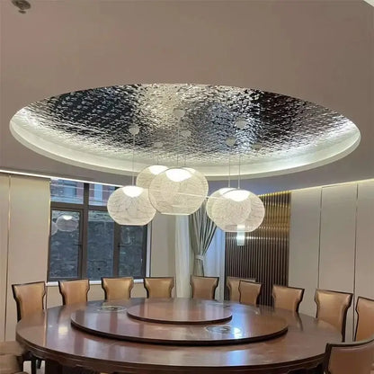Denmark style decorbites designer pendant lamp with circular metallic silver ceiling fixture and white woven spherical lamps