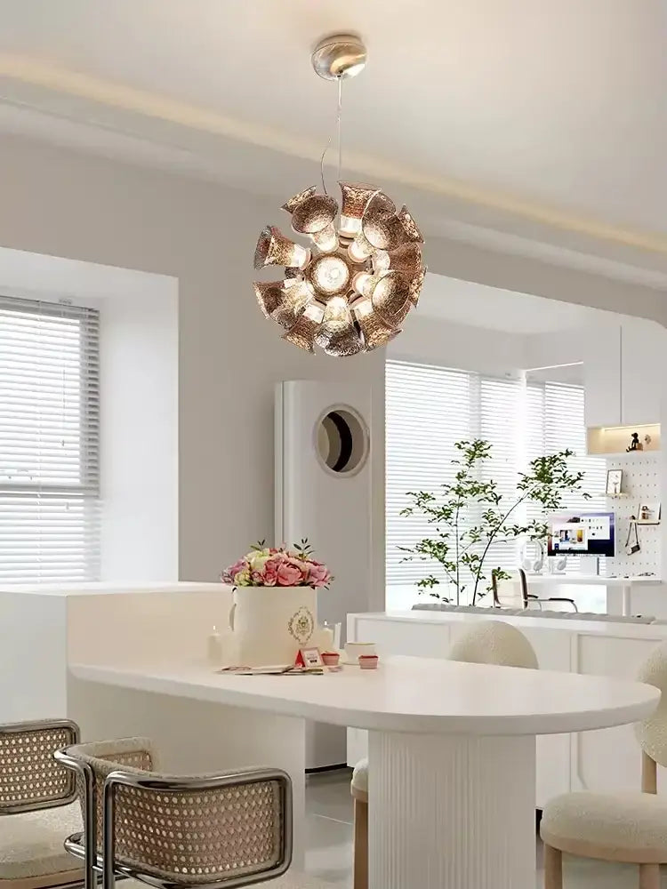 A spherical gold-toned chalice lamp with textured petal design by decorbites designer luxury for living room decor