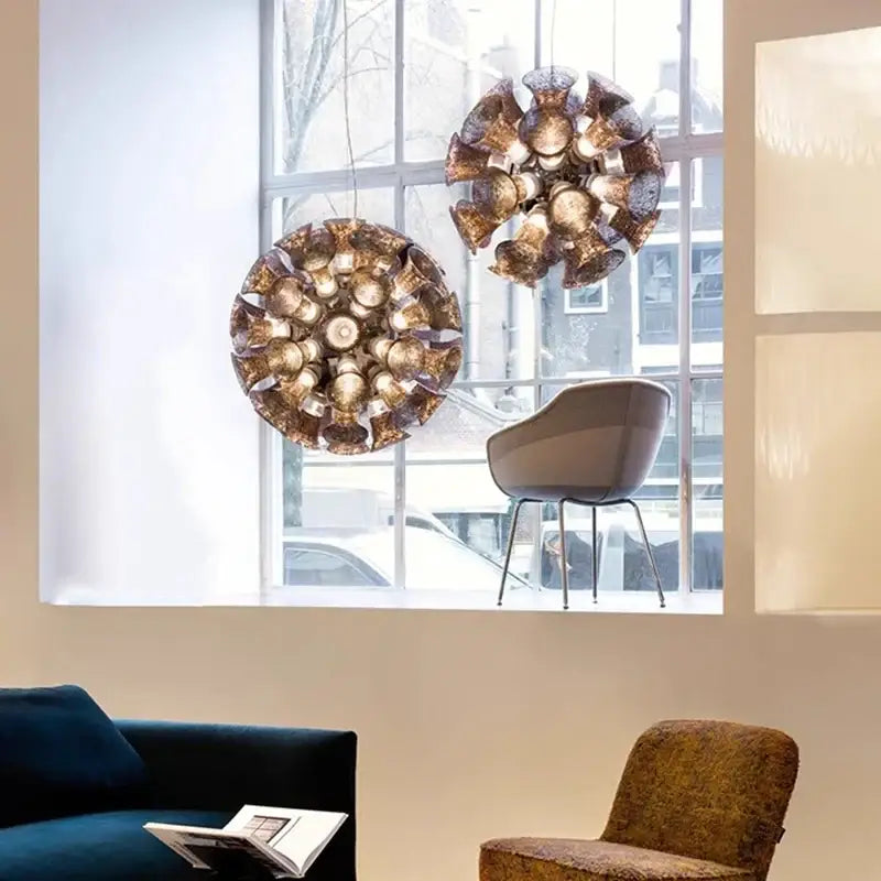 Two ornate gold-toned chalice lamps with petal metalwork by decorbites designer luxury for living room decor