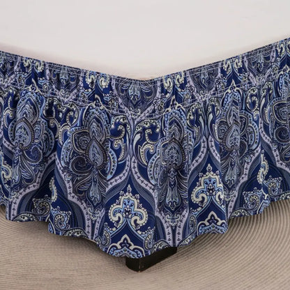 Navy blue and white paisley-patterned bed skirt with diamond lattice ruffled hem and elastic band for bedroom use