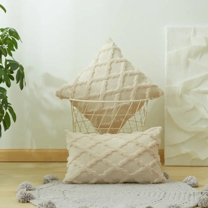 Cream-colored textured pillow with diamond solid embroidery cushion cover and soft fluffy finish for living room use