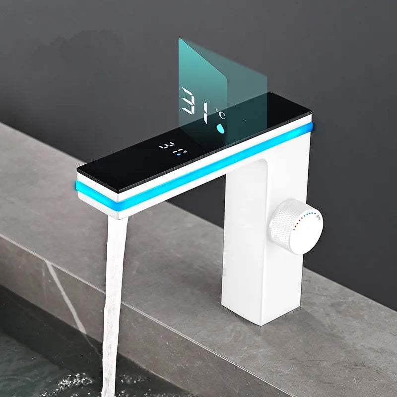 Modern white brass deck mounted single hole bathroom basin faucet with digital display showing 31°c and blue led cold water accents